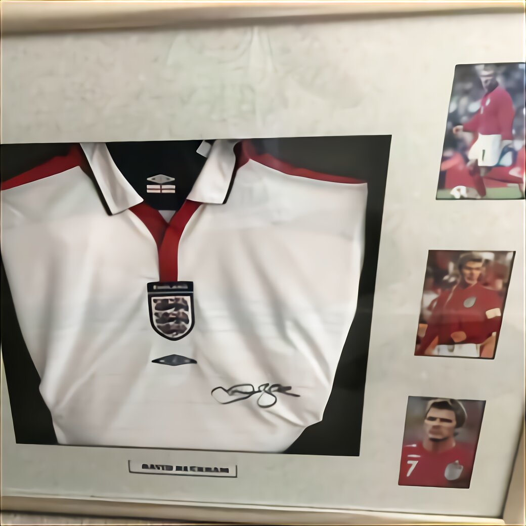 At Auction: DAVID BECKHAM & MICHAEL OWEN SIGNED SOCCER JERSEY