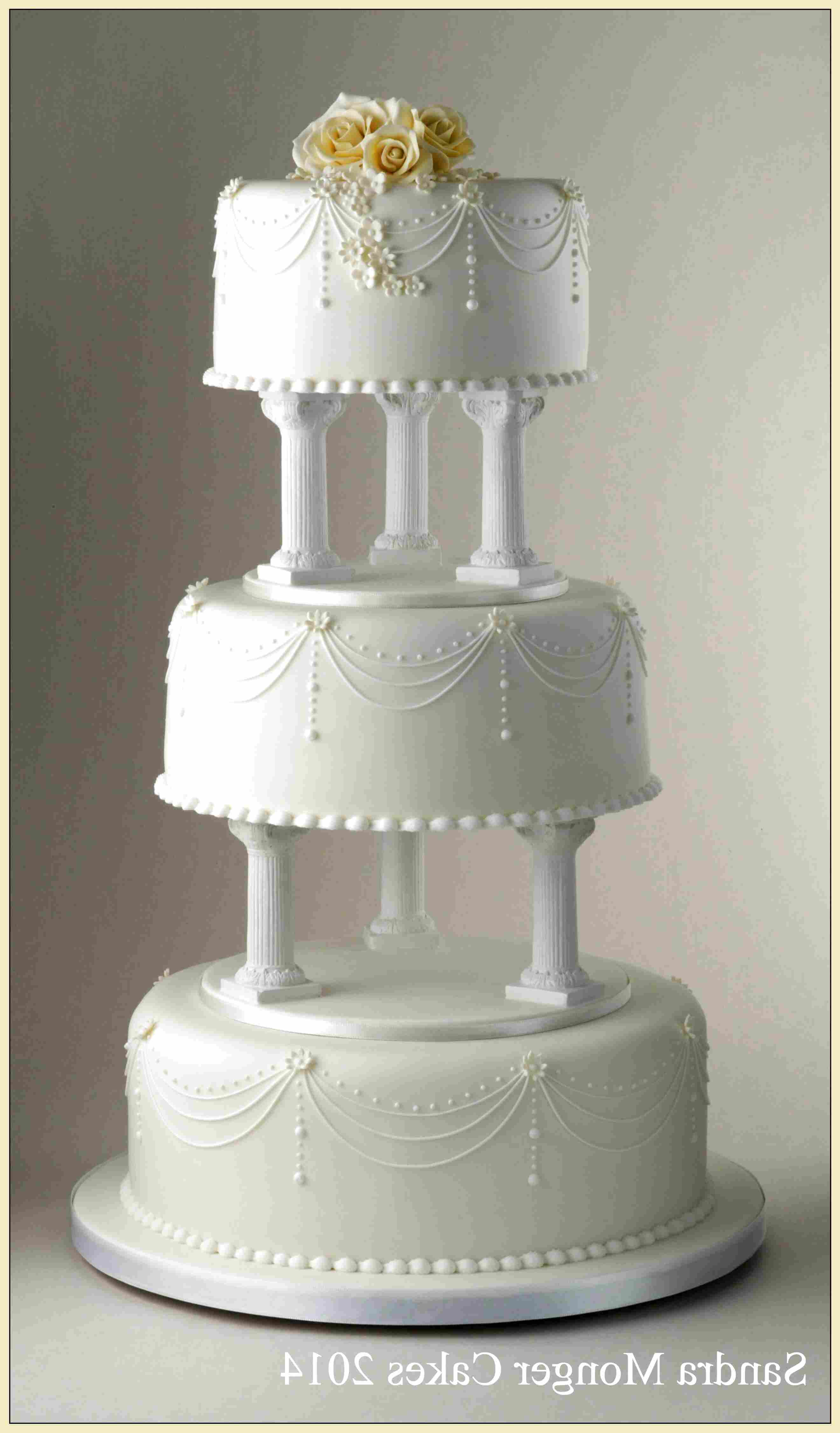 How To Tier A Wedding Cake With Pillars Rodriguez Viey