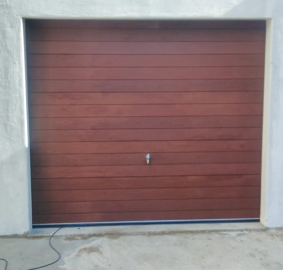 commercial door plastic with a dead air space about 1 inch deep garage